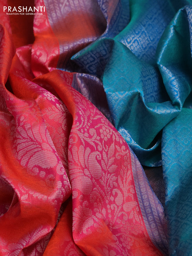 Pure soft silk saree dual shade of pinkish orange and teal blue with allover silver zari woven brocade weaves and zari woven border