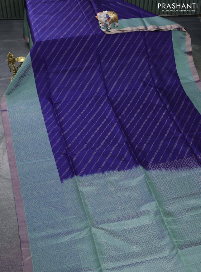 Pure soft silk saree navy blue and pastel green with allover zari weaves and long zari wovenborder