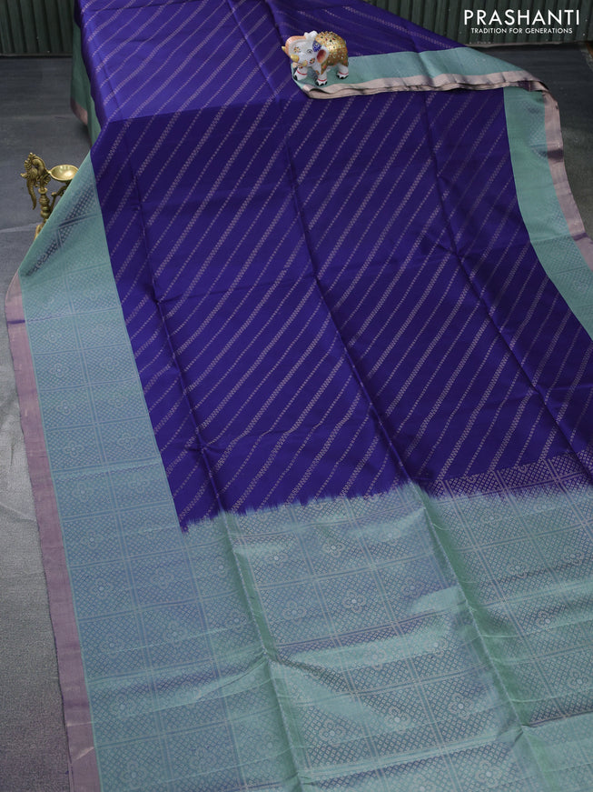 Pure soft silk saree navy blue and pastel green with allover zari weaves and long zari wovenborder
