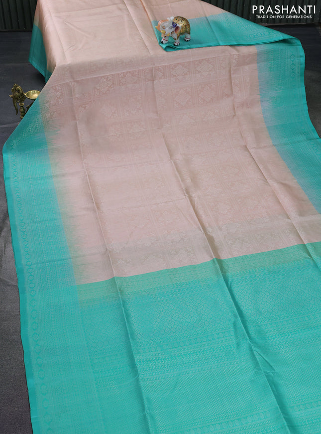 Pure soft silk saree pastel peach and teal green with allover silver zari woven brocade weaves and long zari woven border