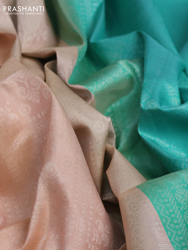 Pure soft silk saree pastel peach and teal green with allover silver zari woven brocade weaves and long zari woven border