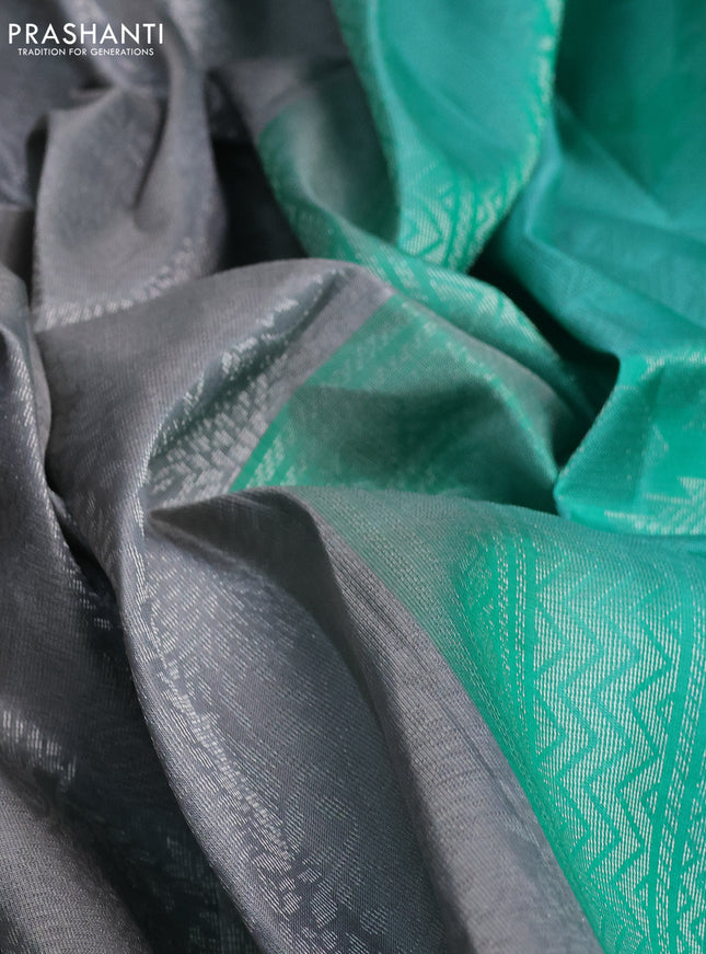 Pure soft silk saree grey and teal green with allover silver zari woven brocade weaves and zari woven simple border