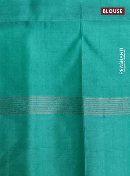 Pure soft silk saree grey and teal green with allover silver zari woven brocade weaves and zari woven simple border