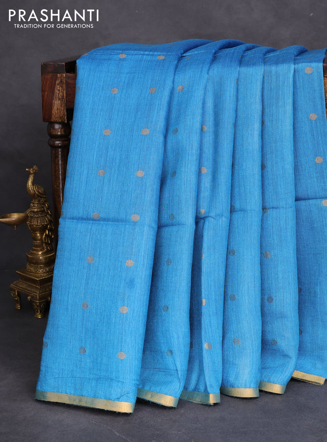 Munga tussar silk saree cs blue with allover zari woven buttas and zari woven border
