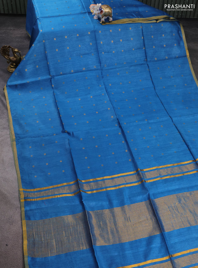 Munga tussar silk saree cs blue with allover zari woven buttas and zari woven border