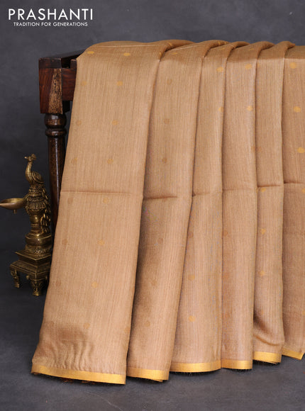 Munga tussar silk saree sandal with allover zari woven buttas and zari woven border