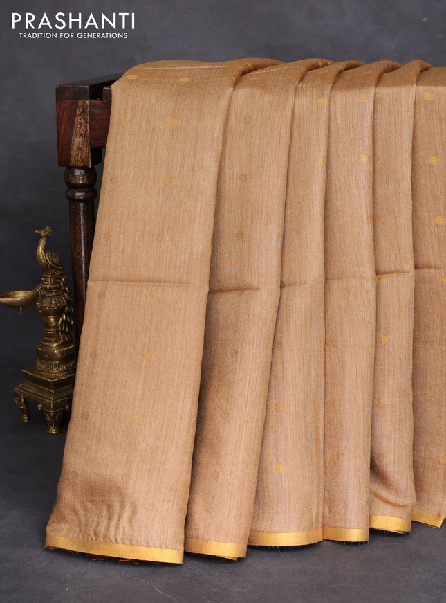 Munga tussar silk saree sandal with allover zari woven buttas and zari woven border