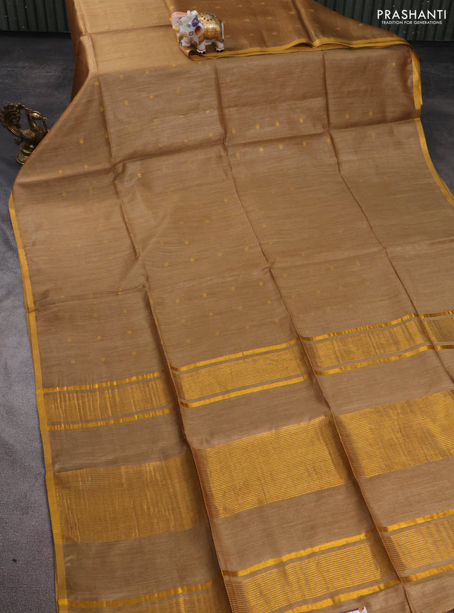 Munga tussar silk saree sandal with allover zari woven buttas and zari woven border