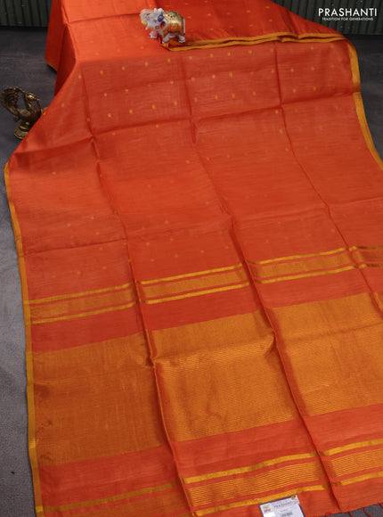 Munga tussar silk saree orange with allover zari woven buttas and zari woven border