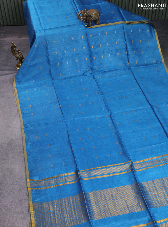 Munga tussar silk saree cs blue with allover zari woven buttas and zari woven border