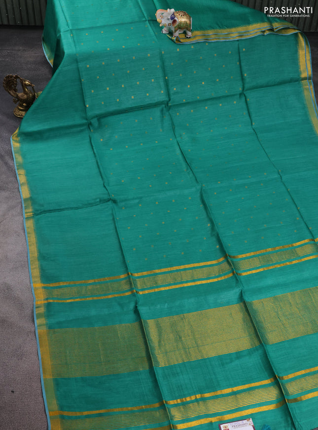 Munga tussar silk saree green with allover zari woven buttas and zari woven border