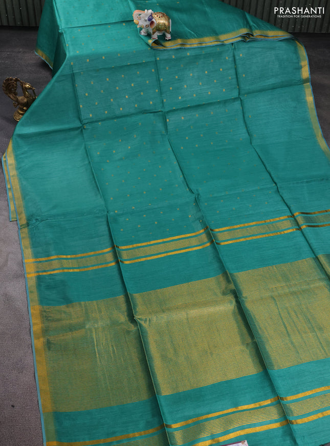 Munga tussar silk saree teal green with allover zari woven buttas and zari woven border