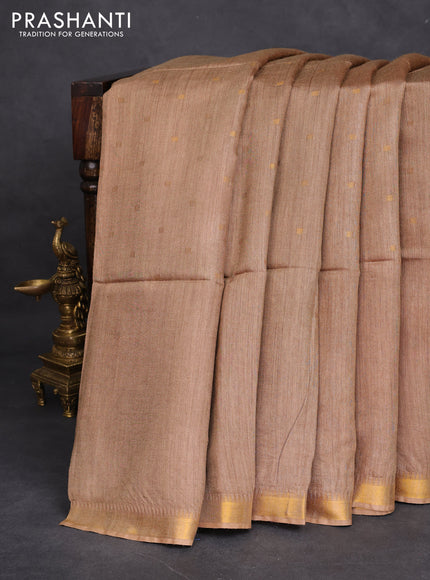 Munga tussar silk saree beige with allover zari woven buttas and zari woven border