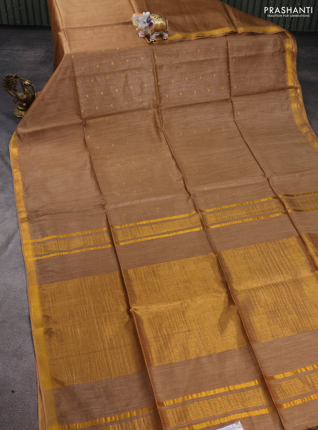 Munga tussar silk saree sandal with allover zari woven buttas and zari woven border