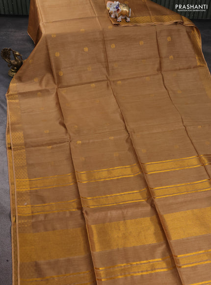 Munga tussar silk saree sandal with allover zari woven buttas and zari woven border