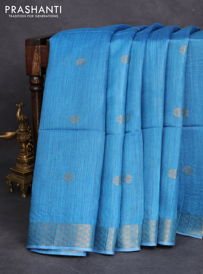 Munga tussar silk saree cs blue with allover zari woven buttas and zari woven border