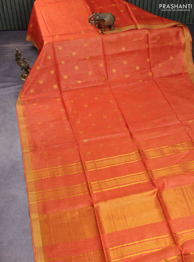 Munga tussar silk saree orange with allover zari woven buttas and zari woven border