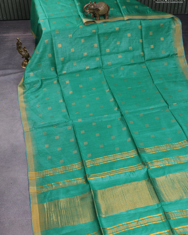 Munga tussar silk saree teal green with allover zari woven buttas and zari woven border