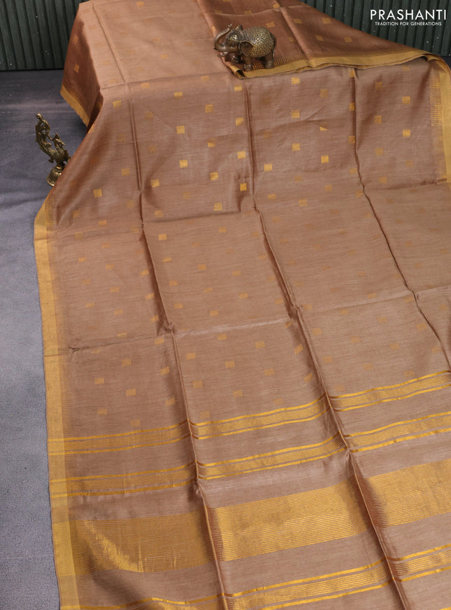 Munga tussar silk saree sandal with allover zari woven buttas and zari woven border