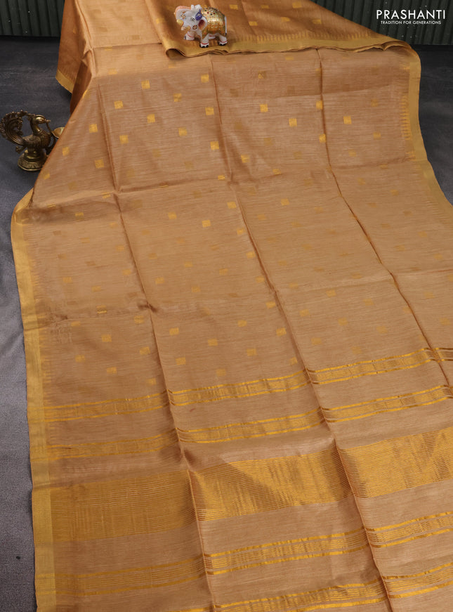 Munga tussar silk saree sandal with allover zari woven buttas and zari woven border