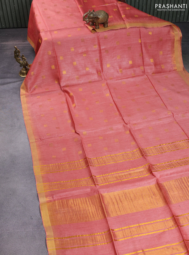 Munga tussar silk saree peach shade with allover zari woven buttas and zari woven border