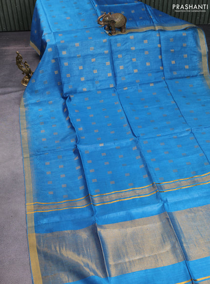 Munga tussar silk saree cs blue with allover zari woven buttas and zari woven border