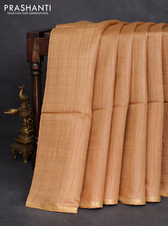 Munga tussar silk saree sandal with allover checked pattern and zari woven border