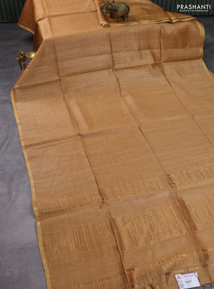 Munga tussar silk saree sandal with allover checked pattern and zari woven border