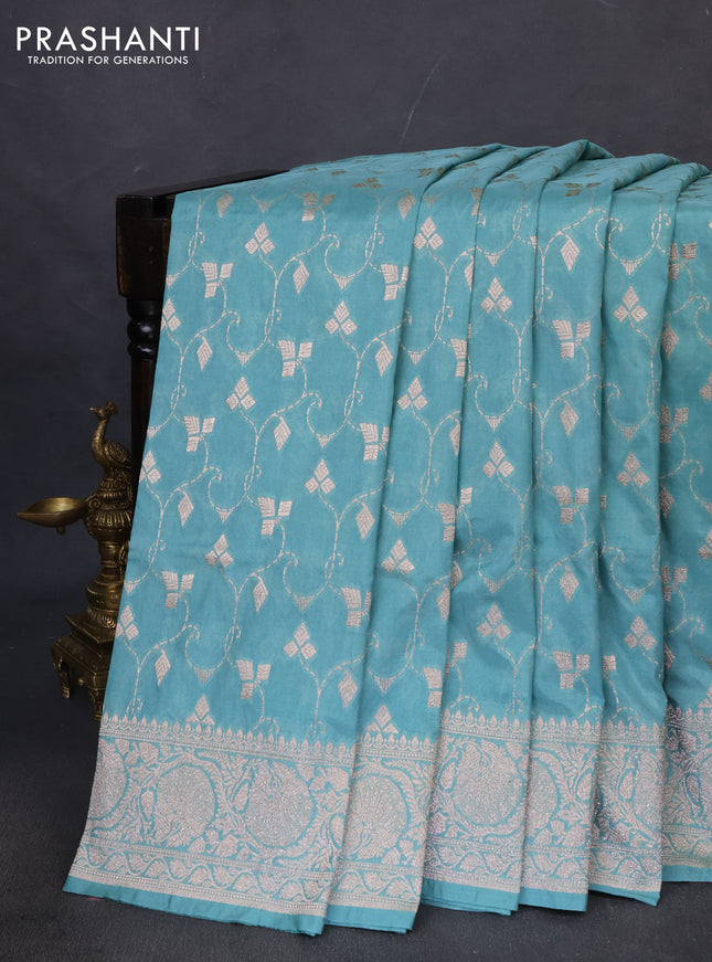 Banarasi semi katan saree teal blue with allover zari weaves and zari woven border
