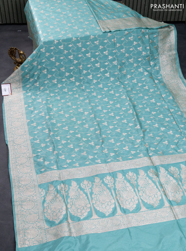Banarasi semi katan saree teal blue with allover zari weaves and zari woven border
