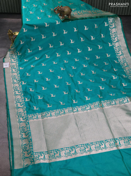 Banarasi semi katan saree teal green with zari woven buttas and zari woven border