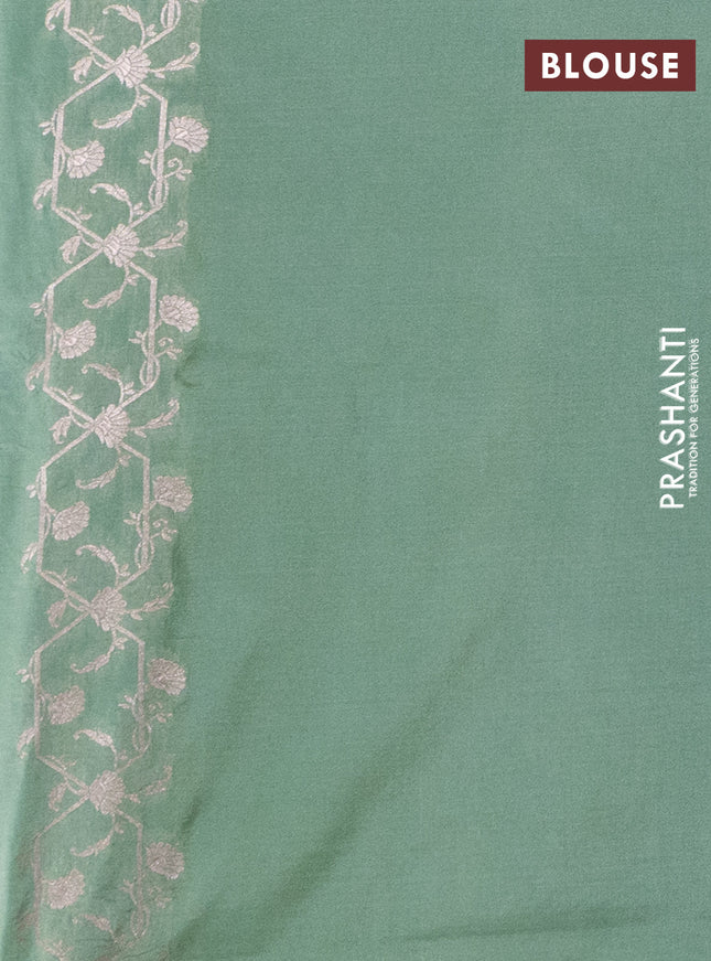 Banarasi semi katan saree pastel green with allover woven buttas and woven border