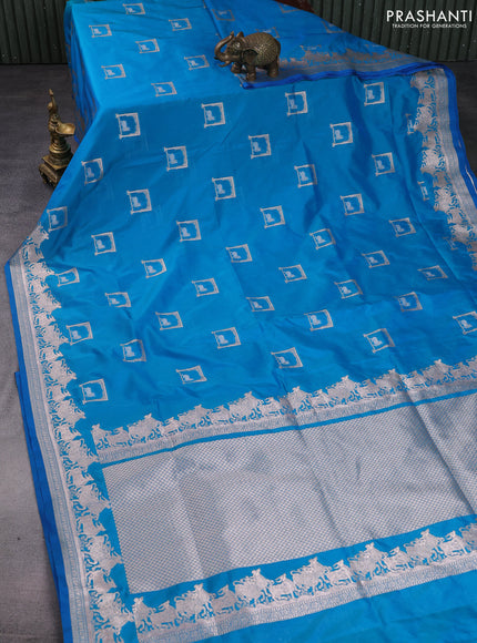 Banarasi semi katan saree dual shade of teal blue with zari woven buttas and zari woven border