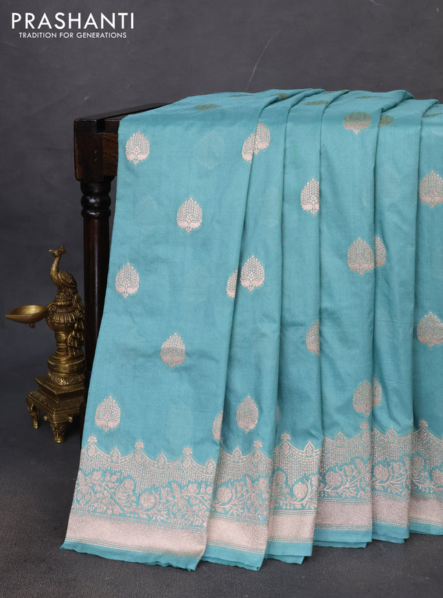 Banarasi semi katan saree pastel green with zari woven buttas and zari woven border