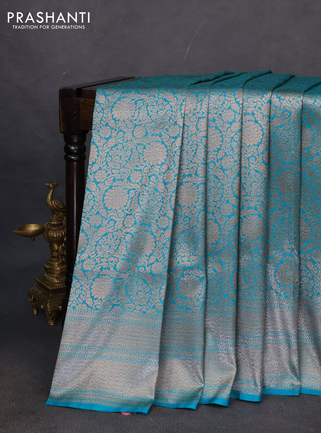 Banarasi semi katan saree teal blue with allover thread & zari woven brocade weaves and woven border