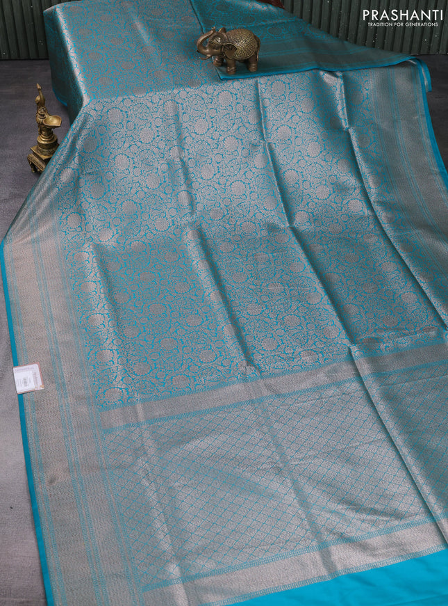Banarasi semi katan saree teal blue with allover thread & zari woven brocade weaves and woven border