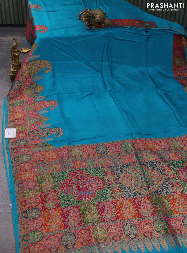 Banarasi silk saree teal blue with plain body and position prints