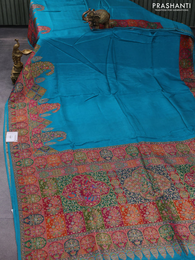 Banarasi silk saree teal blue with plain body and position prints