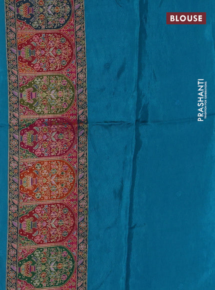 Banarasi silk saree teal blue with plain body and position prints