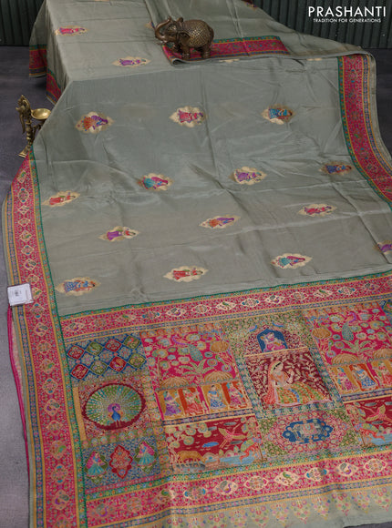 Banarasi silk saree elaichi green with position butta prints and position prints