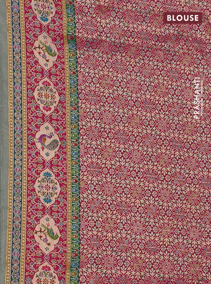 Banarasi silk saree elaichi green with position butta prints and position prints