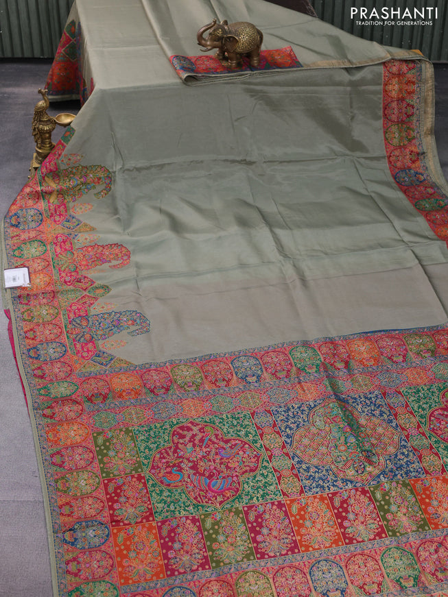 Banarasi silk saree pastel green with plain body and position prints