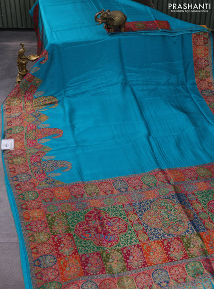 Banarasi silk saree teal blue with plain body and position prints