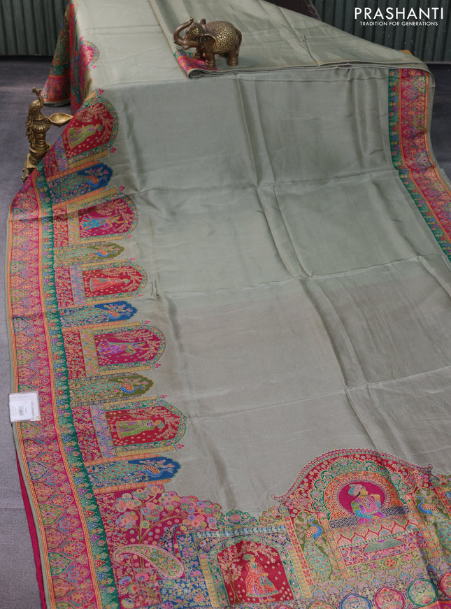 Banarasi silk saree pastel green with plain body and position prints