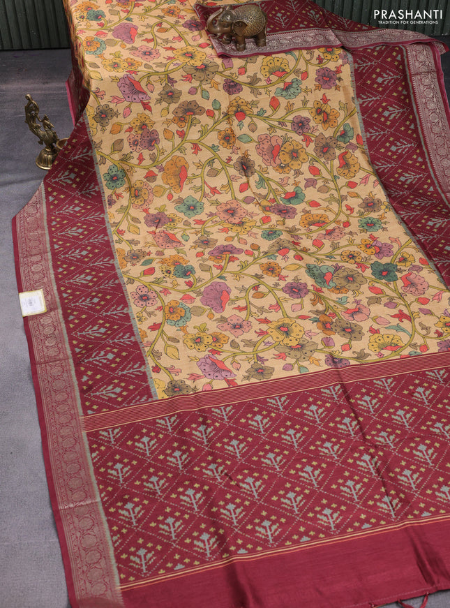 Matka tussar saree sandal and maroon with allover kalamkari prints and zari woven border