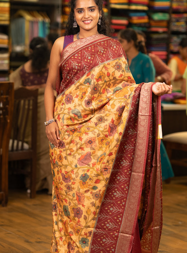 Matka tussar saree sandal and maroon with allover kalamkari prints and zari woven border