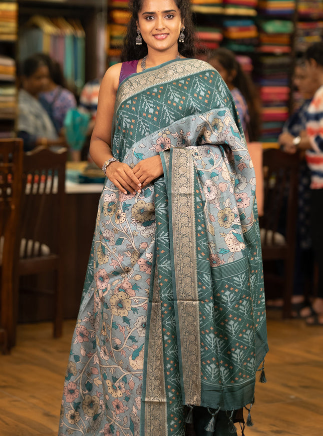 Matka tussar saree grey and green with allover kalamkari prints and zari woven border
