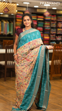 Matka tussar saree lime yellow and teal green with allover kalamkari prints and zari woven border