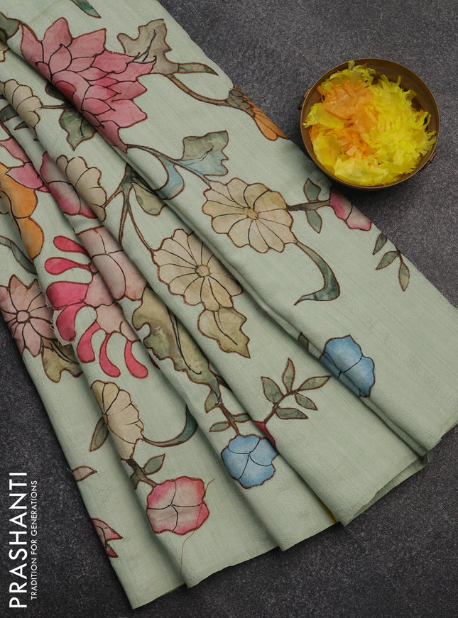 Semi tussar saree pista green with kalamkari applique work in borderless style