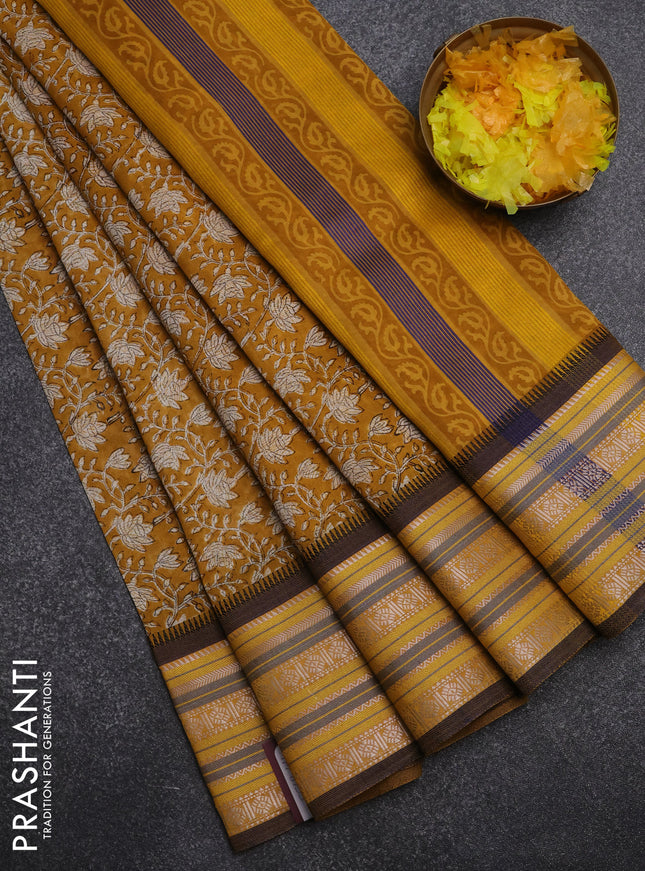 Maheshwari silk cotton saree mustard yellow with allover floral prints and thread & silver zari woven border